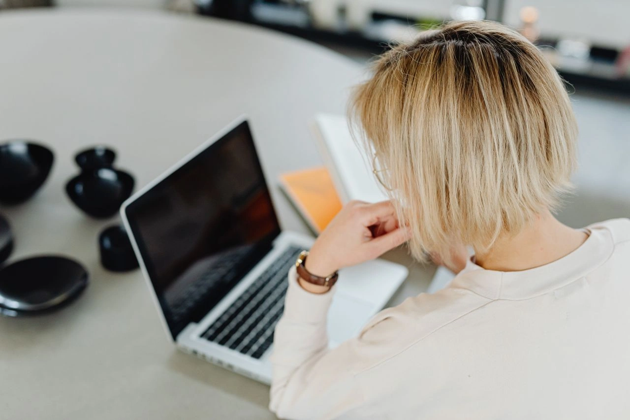 Anonymous online content creator working privately from home