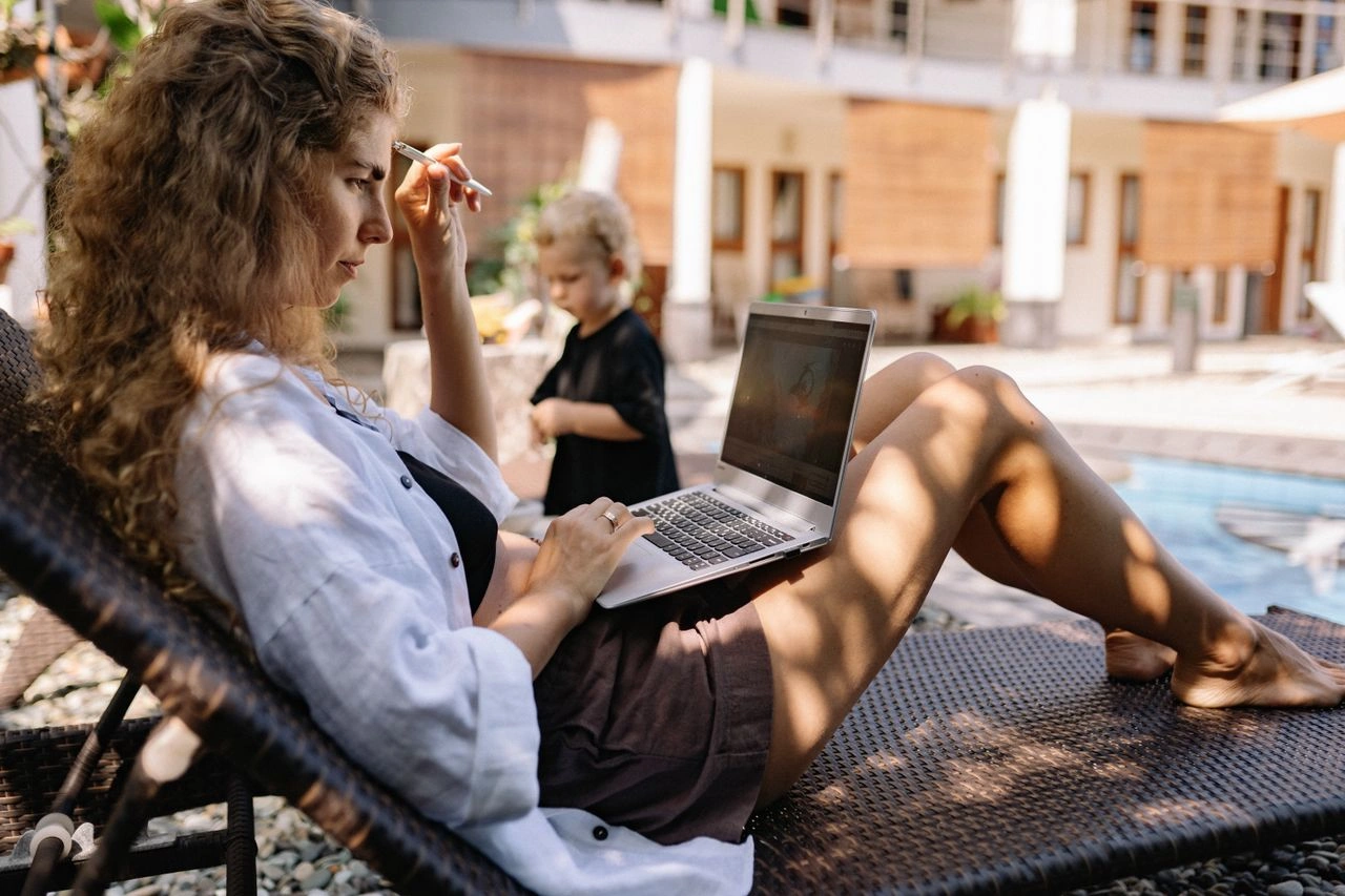Online creator relaxing at home while maintaining separation between personal life and digital work